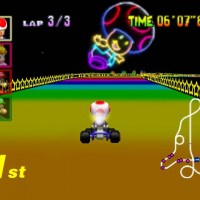 Toad en premoère position sur la route arc-en-ciel dans Mario Kart 64