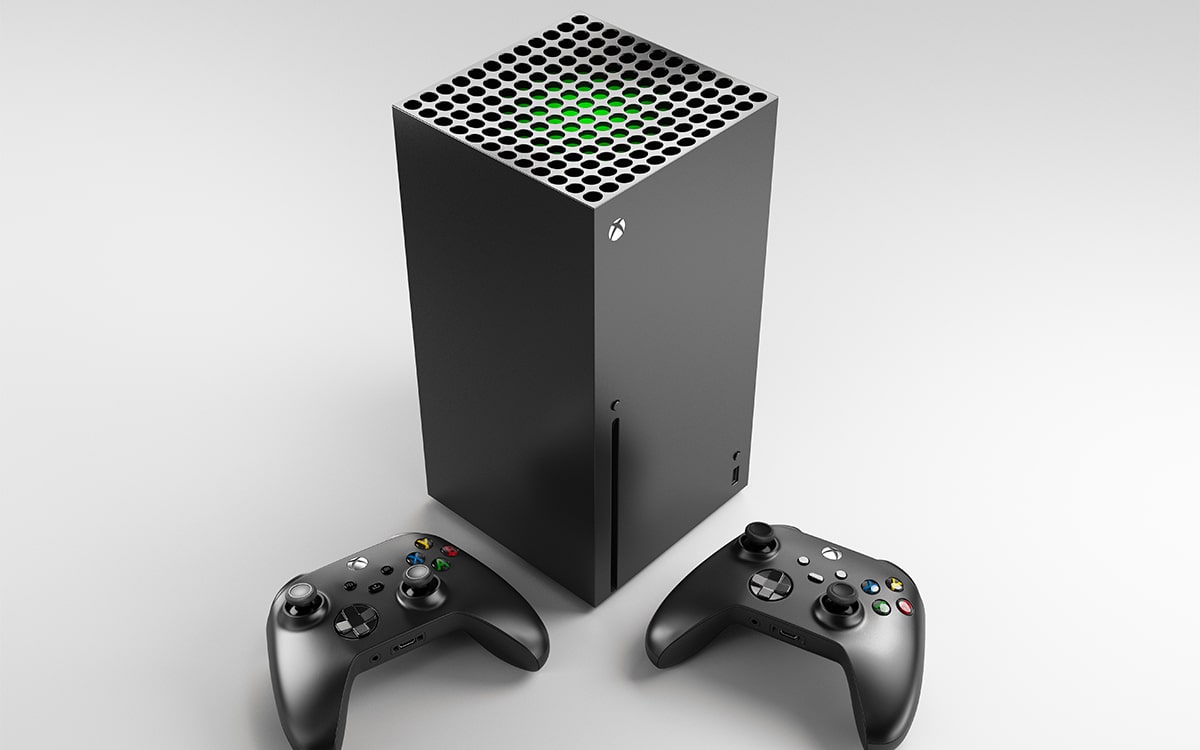 Une Xbox Series X et ses manettes photographiée en plongée.